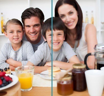A family at breakfast, the photograph sharp on one side of a dividing line and blurred on the other.